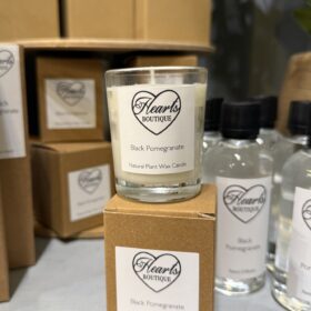 Black Pomegranate Candle Small on display.