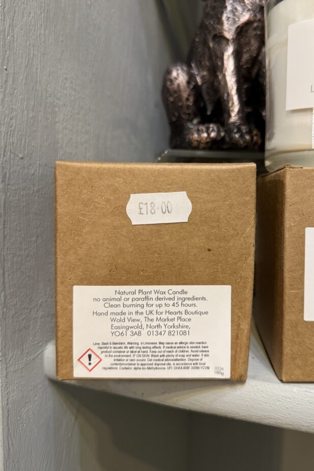 Our Large Pomegranate Candle on display in its box.