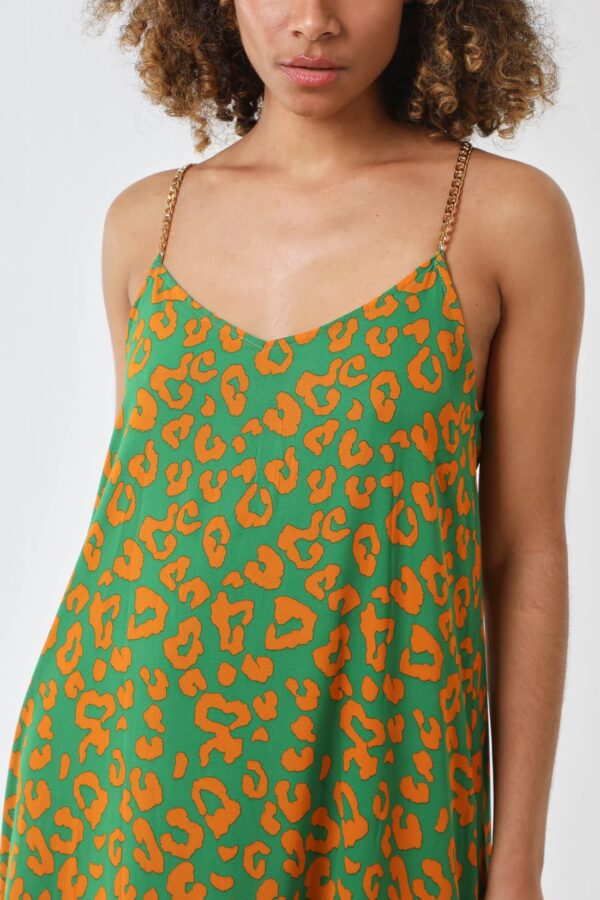 gold straps on green leopard print dress