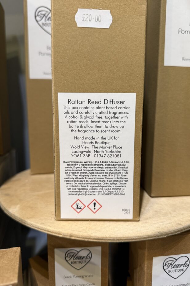 Our reed diffuser in its packaging displayed on a shelf.