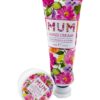 Pink floral hand cream, reads Mum in floral design alongside round container of lip balm.