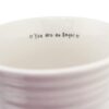 White ceramic mug up close to show detail inside that reads "You are an Angel"
